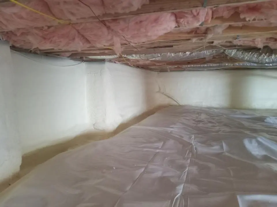 Crawl space encapsulation with closed-cell spray foam for Storm Damage Roof Repair in Carrollton